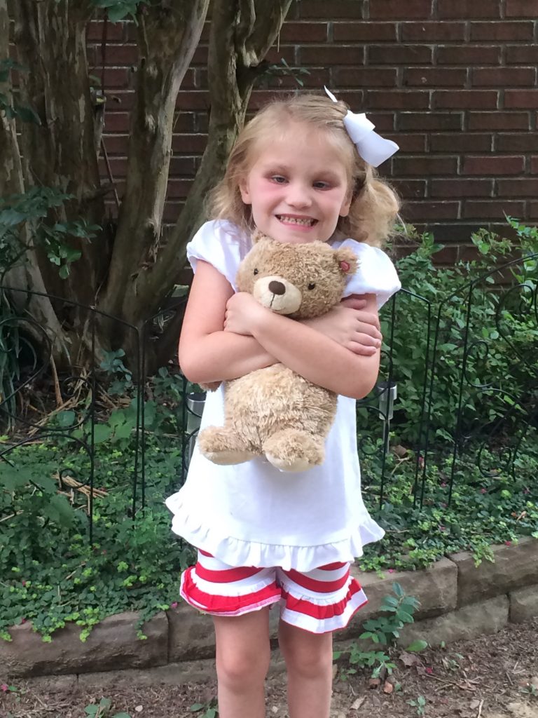 Haley holding her teddy