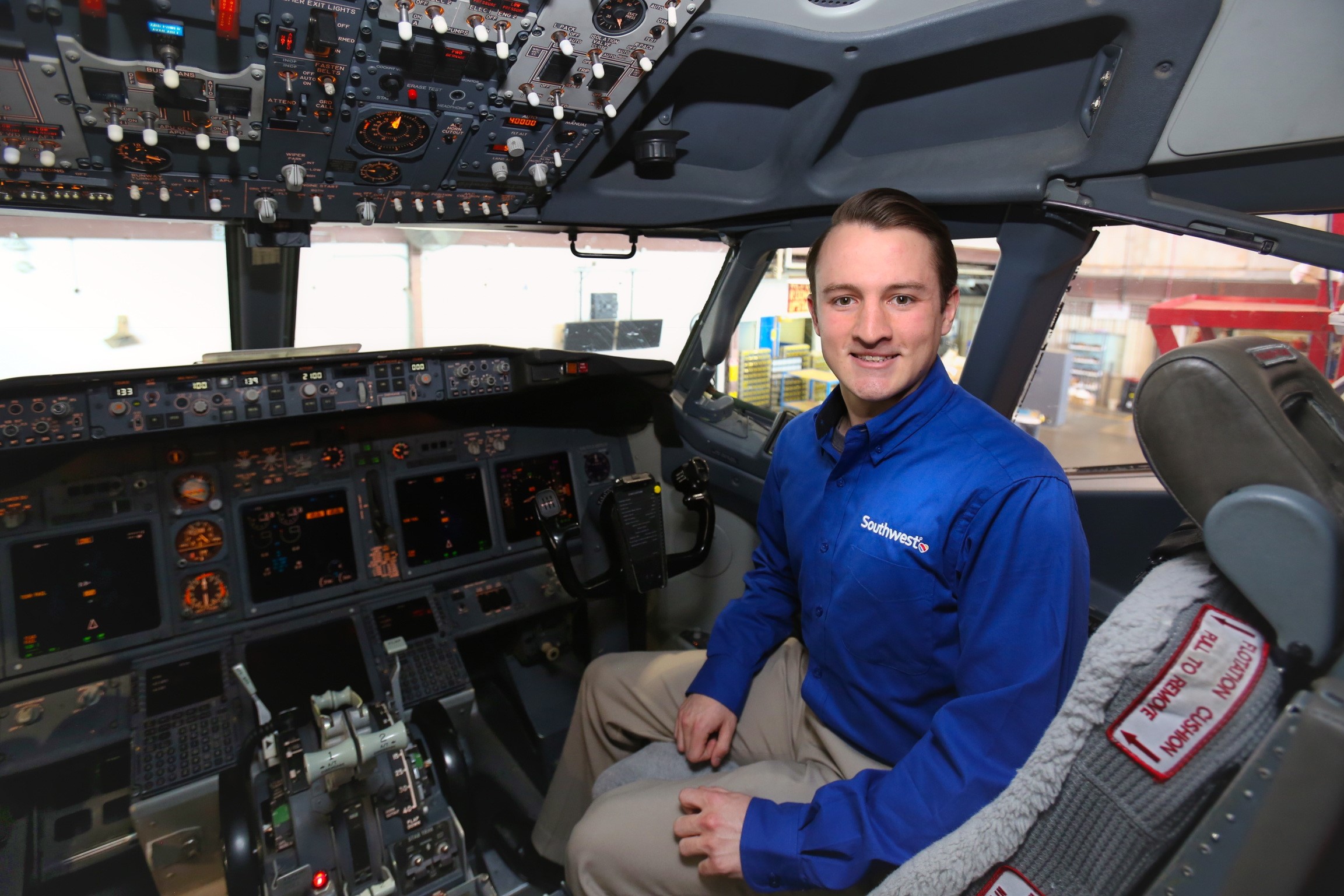 Jordan, aspiring pilot, sitting in the aircraft