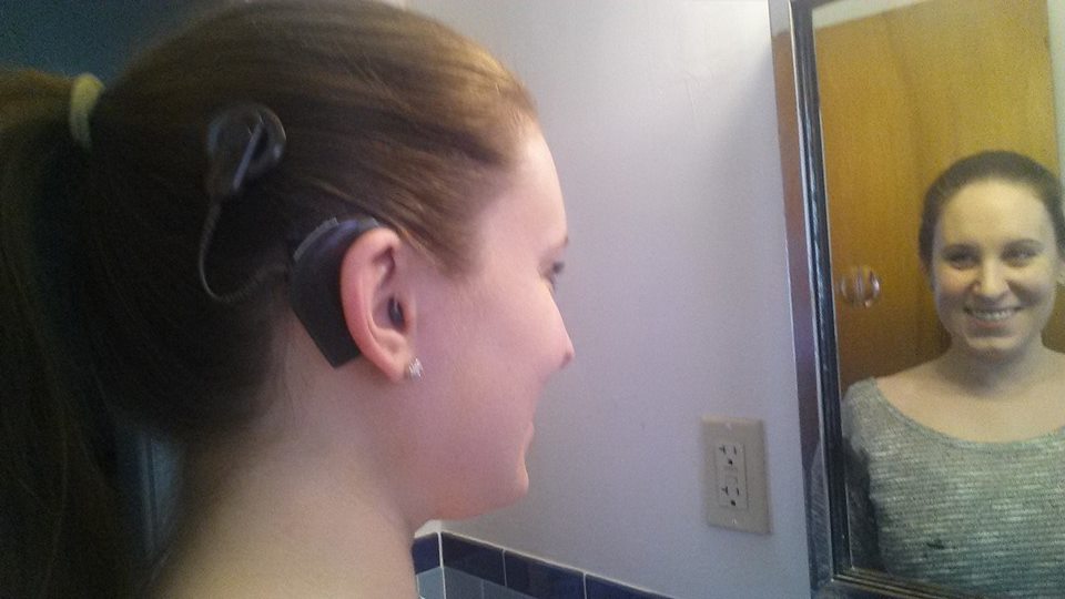 Young woman with Hybrid Hearing