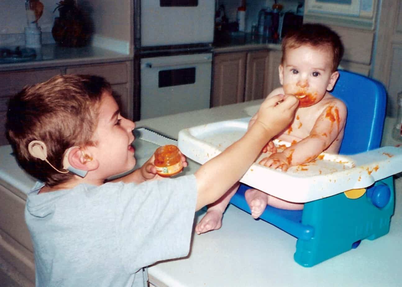 Conner S, a child with sensorineural hearing loss, with his brother