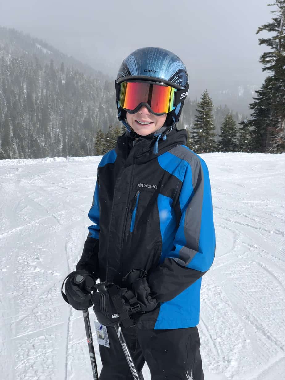 Kevin, who has cochlear implants after failed newborn hearing screening, skiing