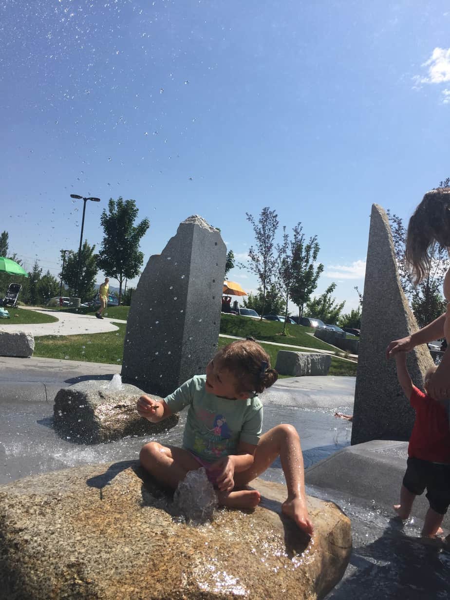 Liviana with an enlarged vestibular aqueduct playing in the water