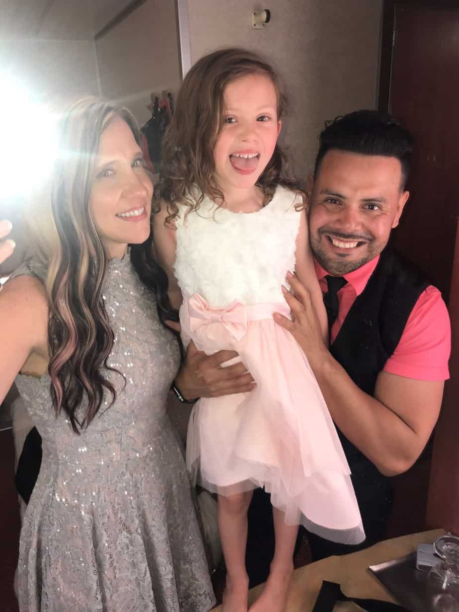 Liviana, who has an enlarged vestibular aqueduct, with her family