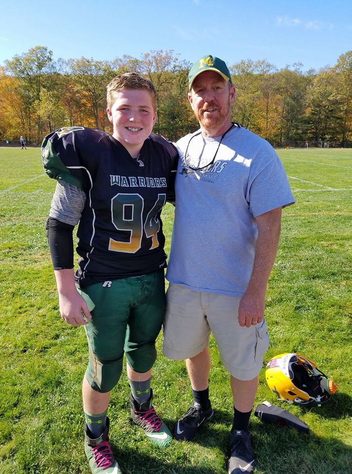 Nicholas, with pediatric sensorineural hearing loss, and his dad