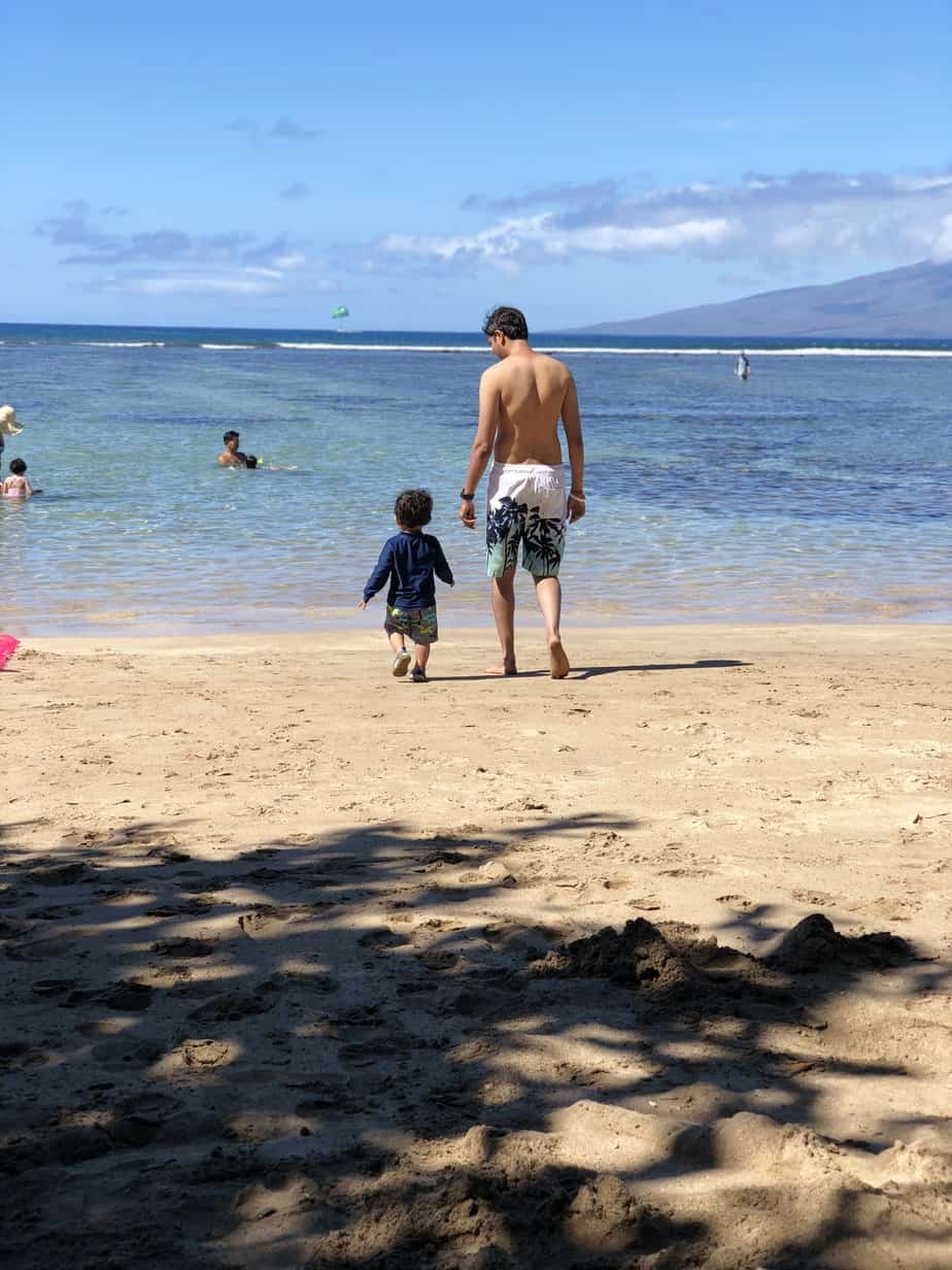 Rishi at the beach, with sensorineural hearing loss