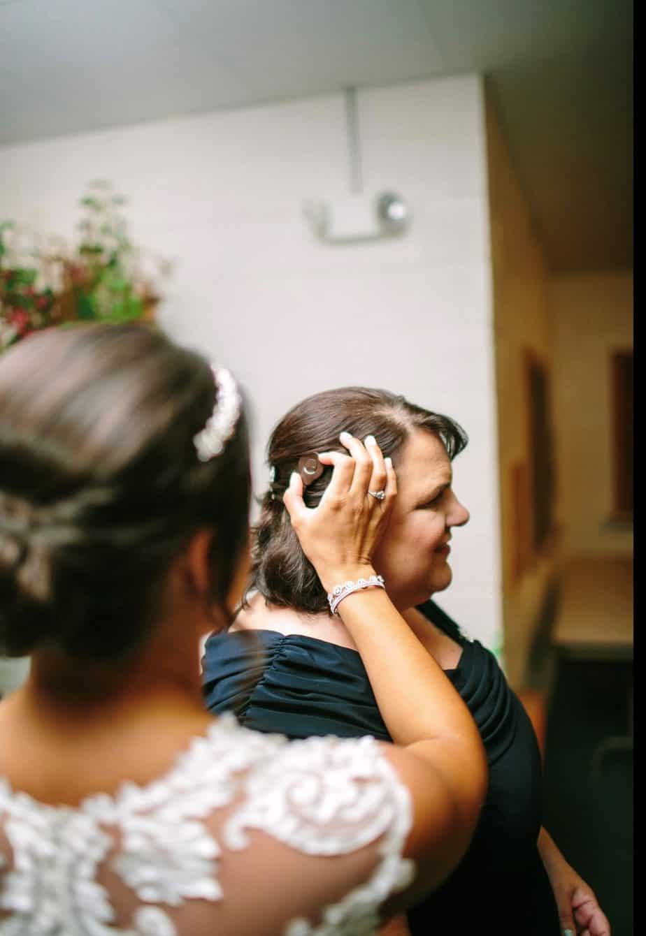 Kate, who used to wear hearing aids, and her daughter at her wedding