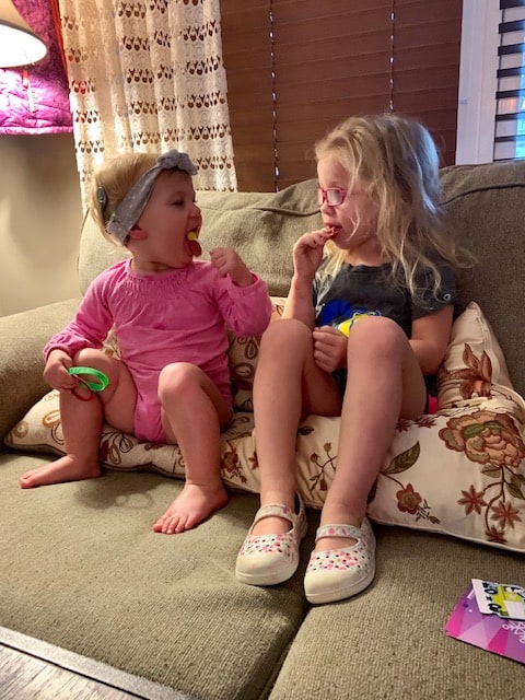 Child with profound hearing loss with sister