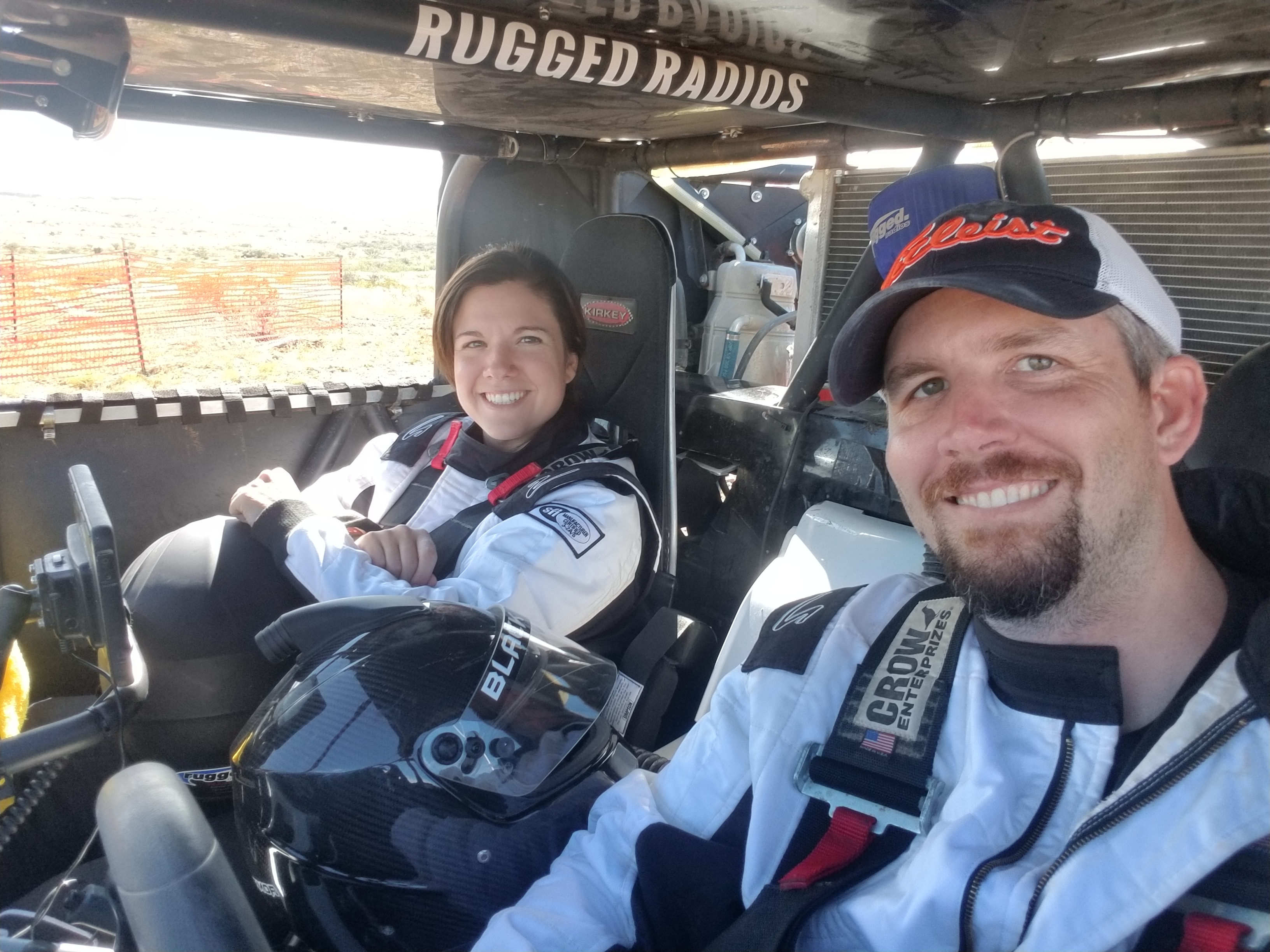 Donnie K., who went from hearing aids to a cochlear implant, with his wife in their UTV