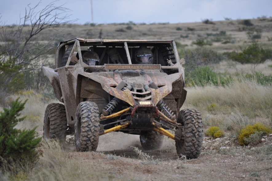 Donnie K. and his UTV after going from hearing aids to a cochlear implant