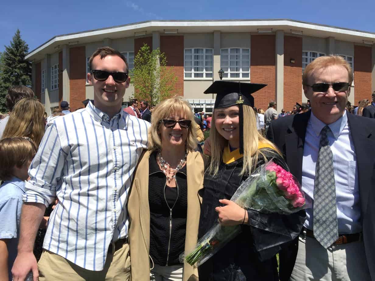 Wendy, with a hybrid cochlear implant, with her family