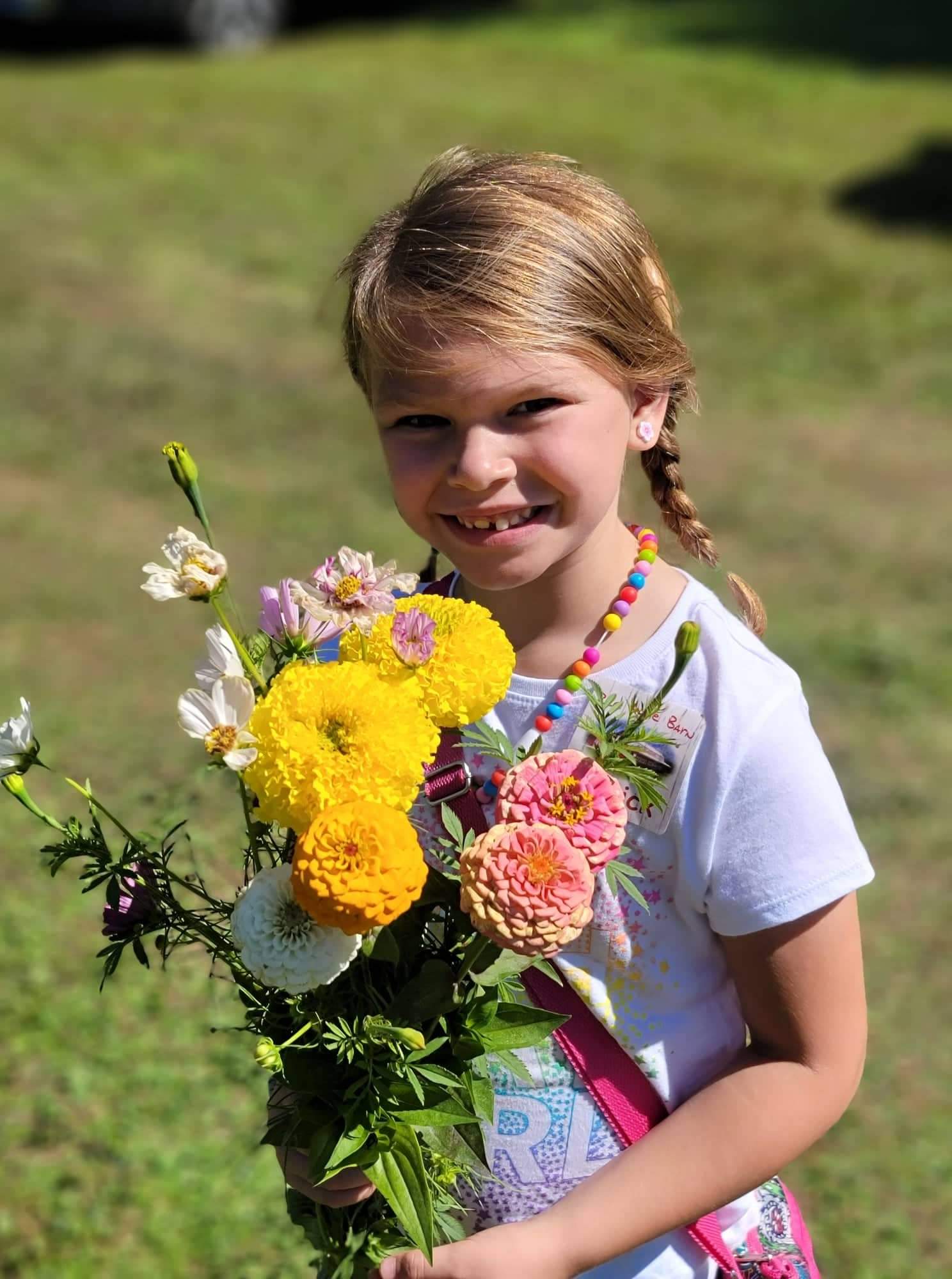 Child who had bacterial meningitis with flowers