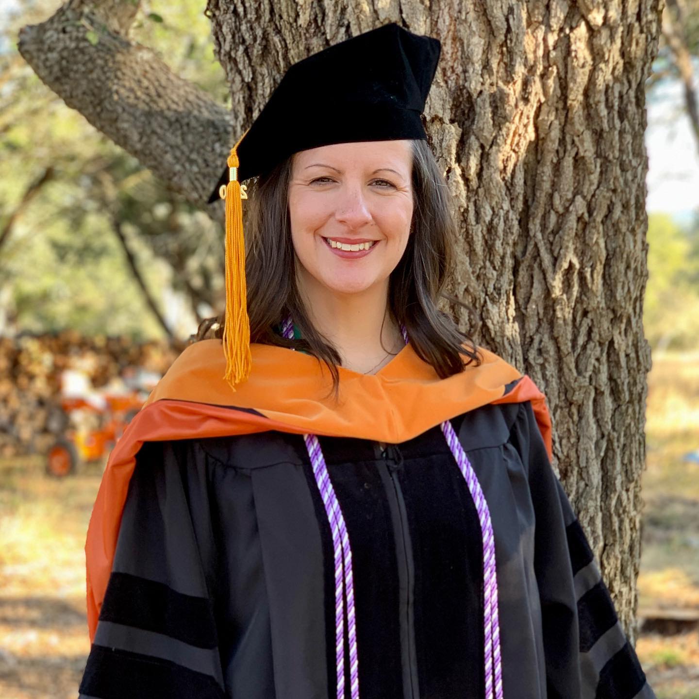 Heidi after graduation, who has a Cochlear Osia System