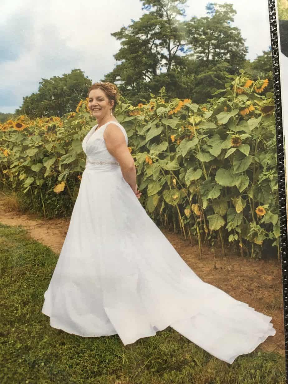 A picture of Penny, a woman who has significant hearing loss, in her wedding gown