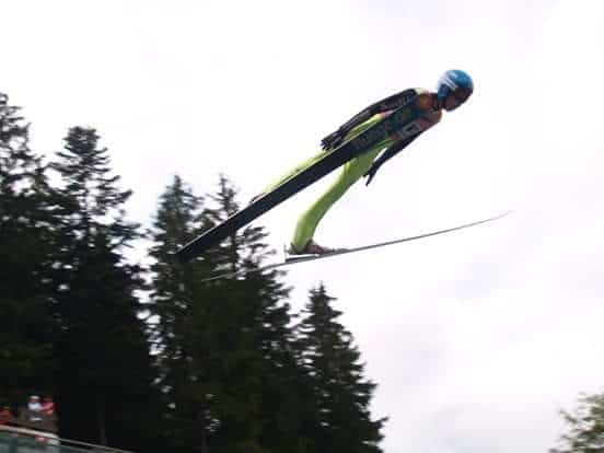 Peter flys high skiing. He is one of the athletes with cochlear implants.