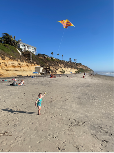 Olive, who received cochlear implants, at the beach