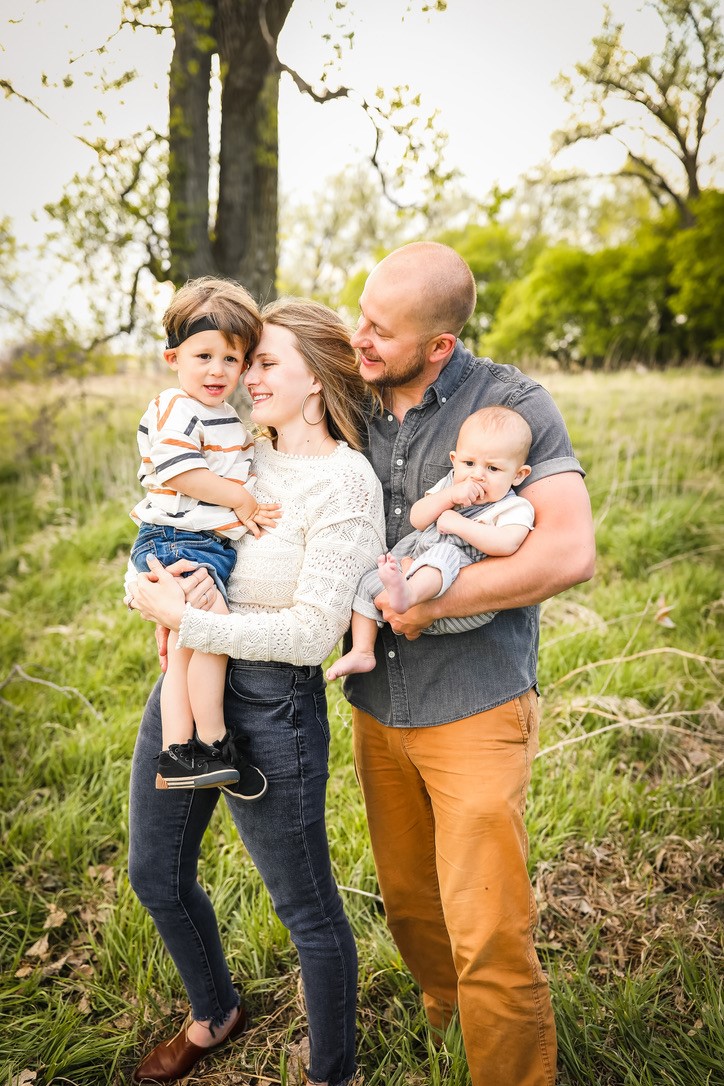 Otto, who has hearing loss from meningitis, with his family