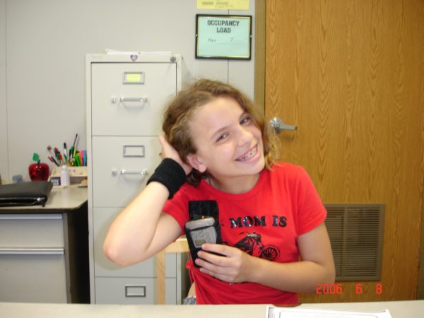 Dayle, a bilateral cochlear recipient as a teen with her cochlear device. 