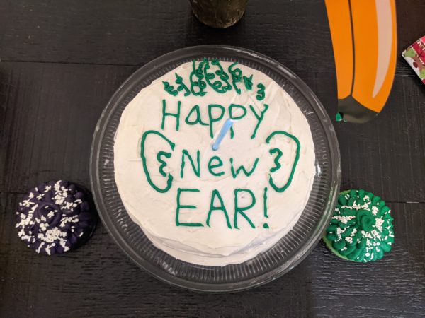 A cake celebrating Jack, a child with bilateral profound hearing loss on his hearing birthday. 