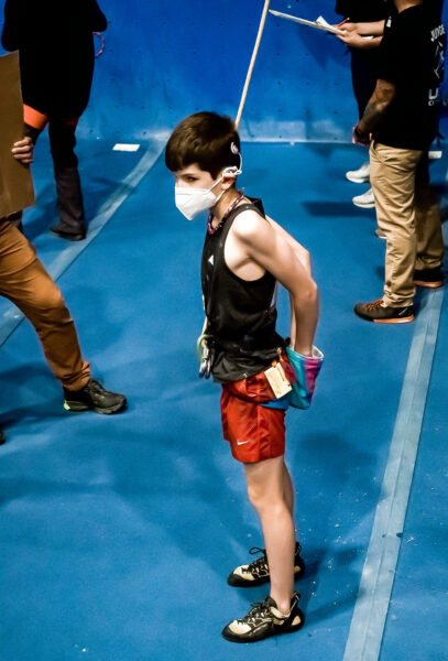 Grayson, who has single sided hearing loss preparing for a rock climbing competition