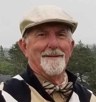 Rodney, turned his hearing loss to a hearing win, smiling at the camera. 