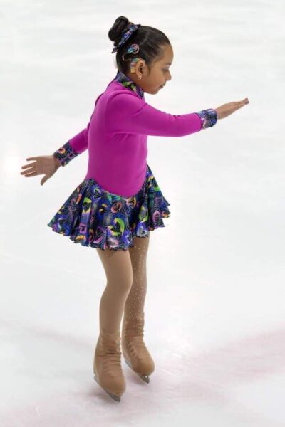 Ariana who has profound hearing loss from the myo15a gene figure skating