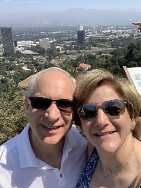 Paula who has confidence from her cochlear implants, posing for a selfie with her husband