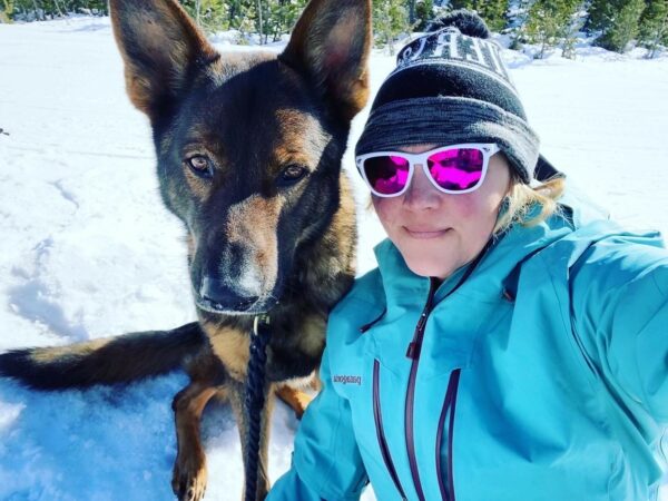 Lori, who has progressive hearing loss, posing for a selfie with her dog Hank. 