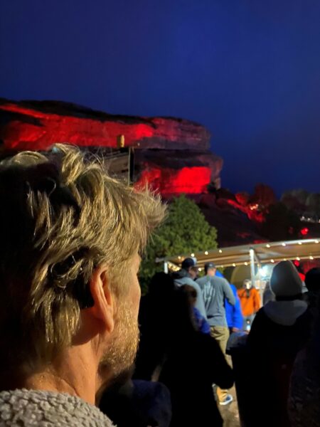 Cochlear Implant Recipient at Red Rocks Amphitheatre enjoying live music with a cochlear implant. 