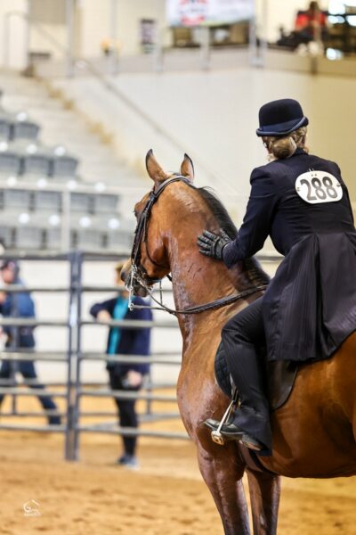 Susanna, who was determined to hear, riding a horse during a competition. 