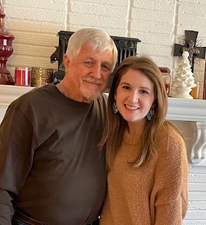 Wayne, the 2022 Hear-o of Year winner, with his granddaughter.