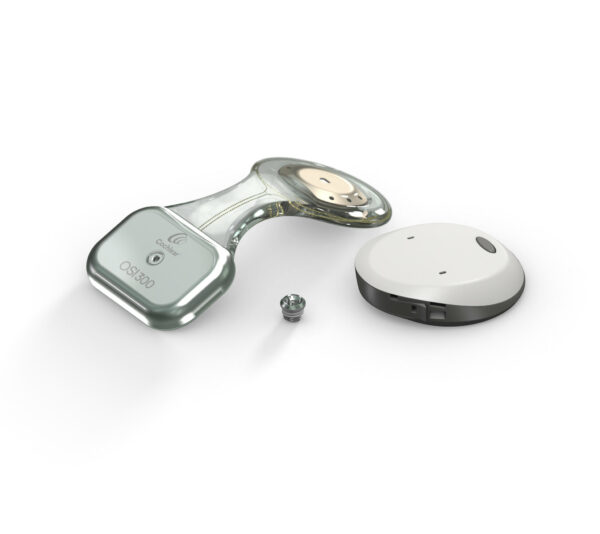 In the United States, the Osia System is now cleared for children ages 5 and older - picture, an OSI300 implant sitting next to an Osia Sound Processor. 
