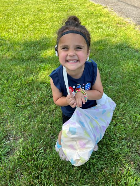 Roxana smiles at the camera while her mom shares her back to school tips.