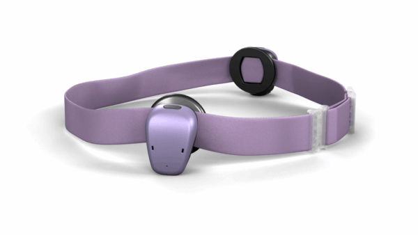 A Baha 7 Sound Processor in Lavender shown connected to the Lavender Baha SoundBand.