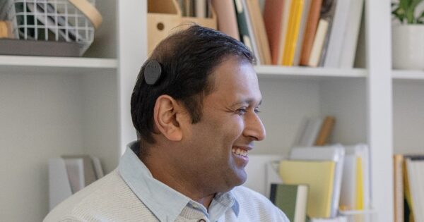 Recipient smiling wearing the Kanso 3 Sound Processor