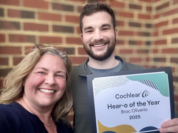 Broc, the 2025 Hear-o of the Year smiles with Genevieve, his Cochlear Engagement Manager who nominated him for the Hear-o of the Year award.