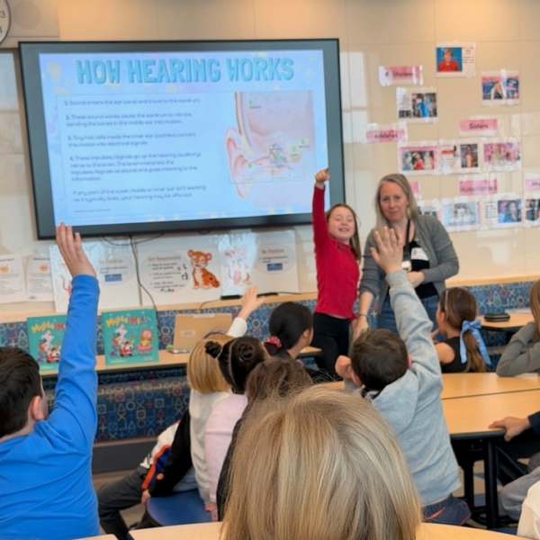 Mila and her Mom, Katie, answering questions from her classmates.
